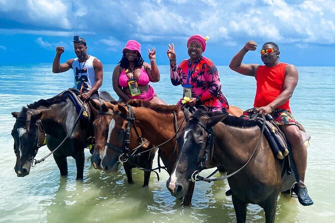 ATV, Bamboo Rafting , Horseback Ride & Blue Hole Falls Ocho Rios - ATV riding on muddy countryside trails