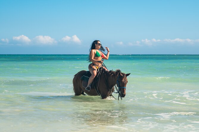 ATV, Bamboo Rafting, Horseback Ride Guided Tour from Montego Bay - ATV riding through Cascade Mountain terrain