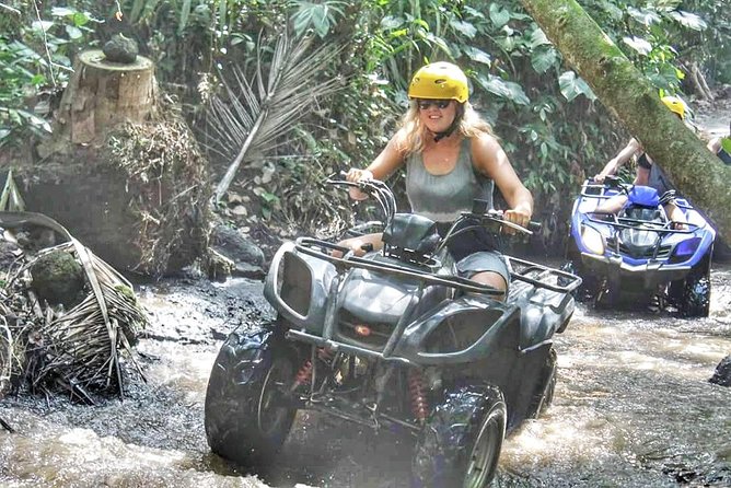 Atv Ride and White Water Rafting Adventures - Rafting past cliffs, mountains, and waterfalls