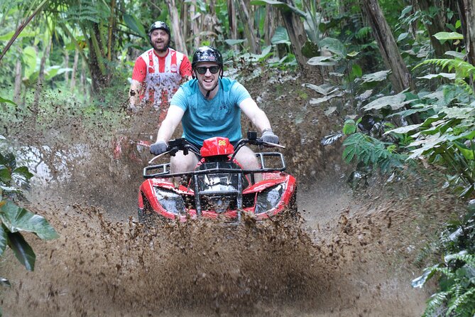 Bali ATV Ride and River Rafting Adventure - Waterfalls, jungle, and carved stone along the route