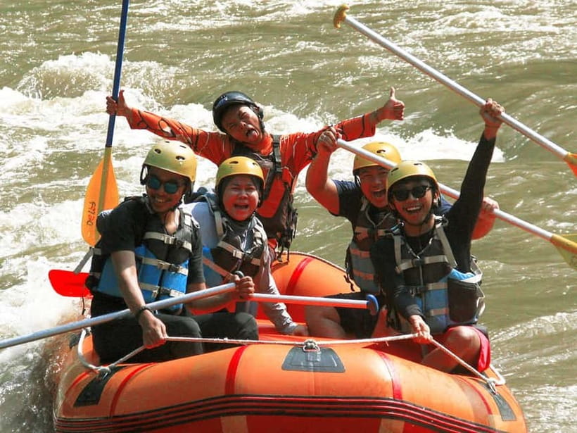 Bali: Ayung River Whitewater Rafting Adventure with Lunch - Waterfalls, rock carvings, and a refreshing river stop