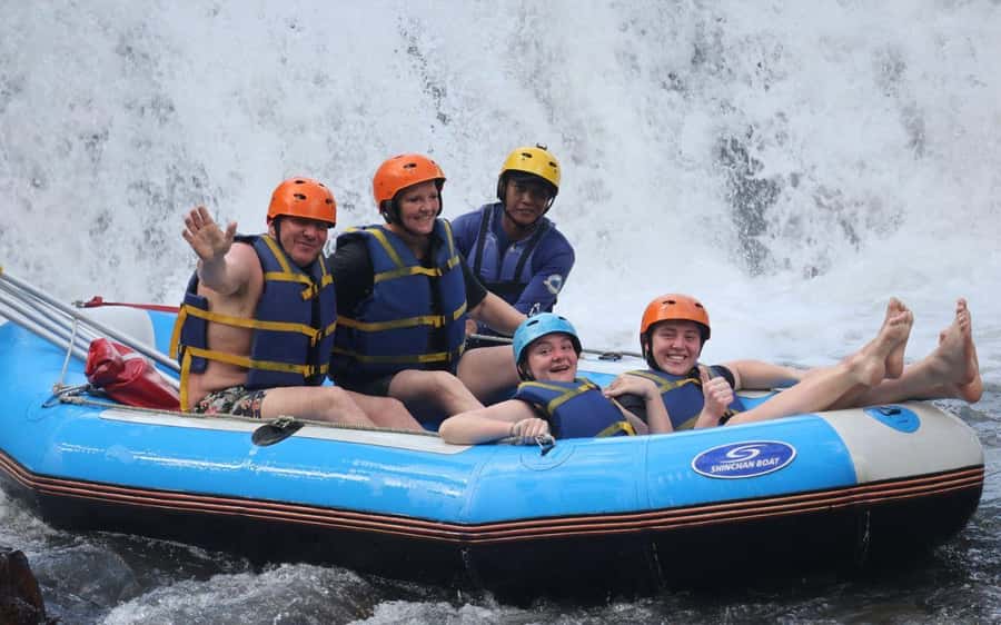 Bali: Telaga Waja White Water Rafting And ATV Quad Adventure - ATV riding through mud, fields, and jungle