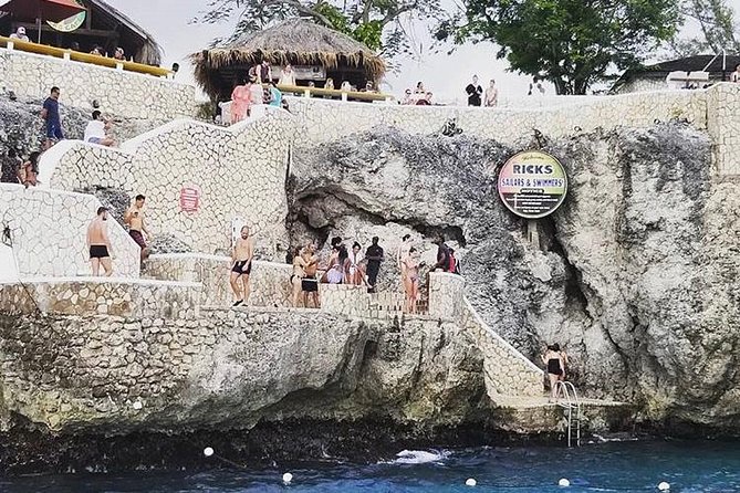 Bamboo Rafting and Limestone Foot Massage with Ricks Cafe Private Tour - The limestone foot massage adds a welcome pause