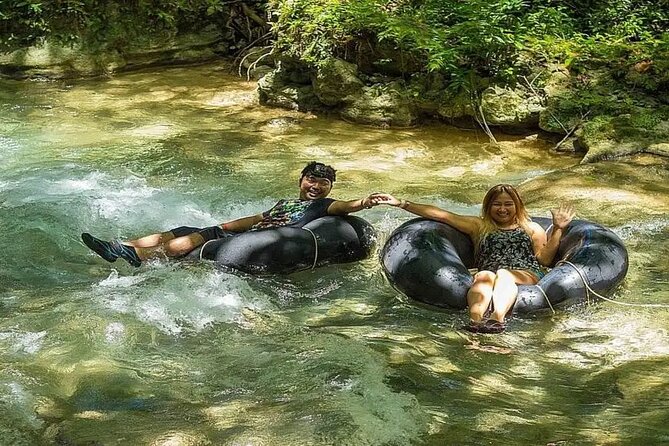 Bamboo Rafting & River Tubing Tour Ocho Rios(Entry Fee Included) - Switching to an oversized tube