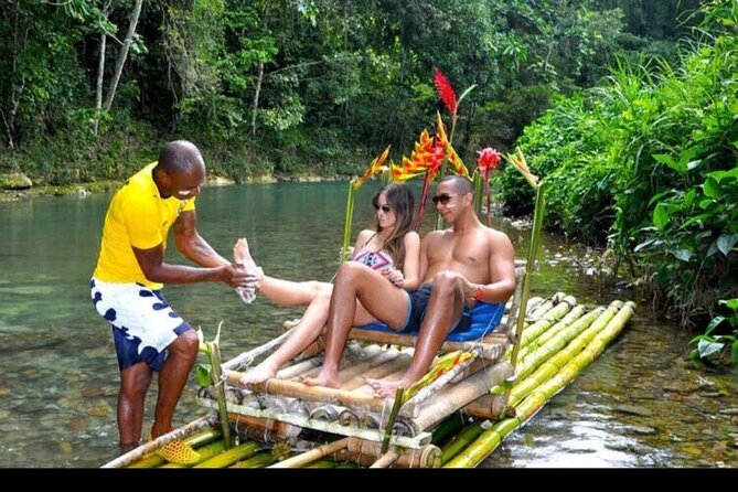 Bamboo rafting with Limestone Foot Massage free rum taste - Shopping, rum tasting, and the Usain Bolt stop