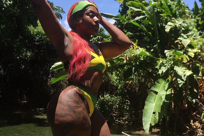 Bamboo River Rafting Experience from Ocho Rios - Getting onto the bamboo raft