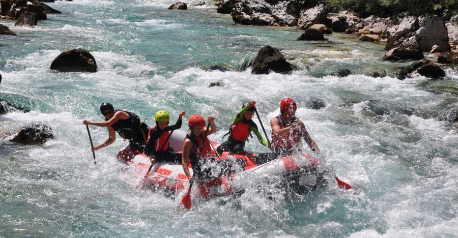 Bovec: Soca River Adventure Rafting With Photos Included - Wetsuits, safety briefing, and the first calm section