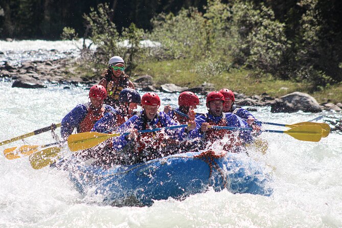 Class 3 Sunwapta River Rafting Adventure in Jasper - Rain, cold water, and the photo question