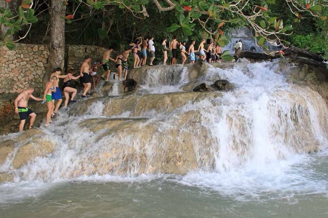 Dunn's River Falls, ATV, Horseback Ride and Bamboo Rafting Tour - A big Jamaican day from Montego Bay