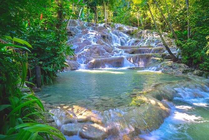 Dunn's River Falls , Bamboo Rafting & ATV Ride from Montego Bay - Climbing the 600-foot Dunn’s River Falls