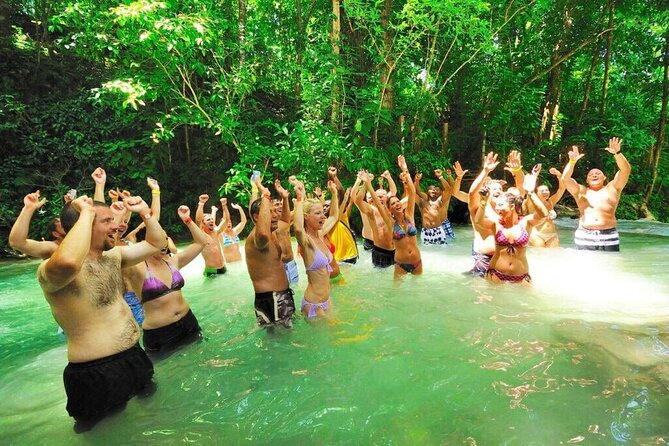 Dunn's River Falls, Blue Hole, Bamboo Rafting, Horseback Combo - Horseback riding into the sea at St. Ann’s Bay
