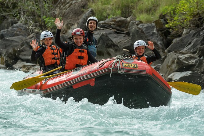 Family Rafting Experience in Engadin - Getting dressed in neoprene gear