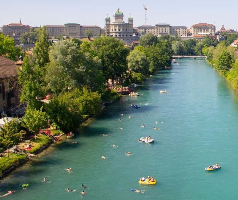 From Zurich: Private Aare River Rafting Day Trip to Bern - Preparing for the float in Thun