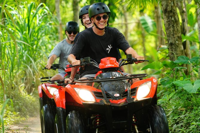 Full-Day Bali Adventure Tour with Quad Bikes and Rafting - ATV riding through rice fields and jungle tracks