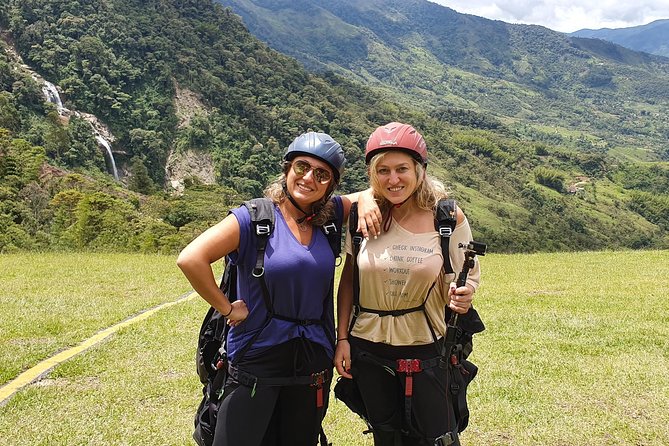 Fun RAFTING + Awesome PARAGLIDING over giant waterfalls from MEDELLIN - The mountain lunch stop around midday