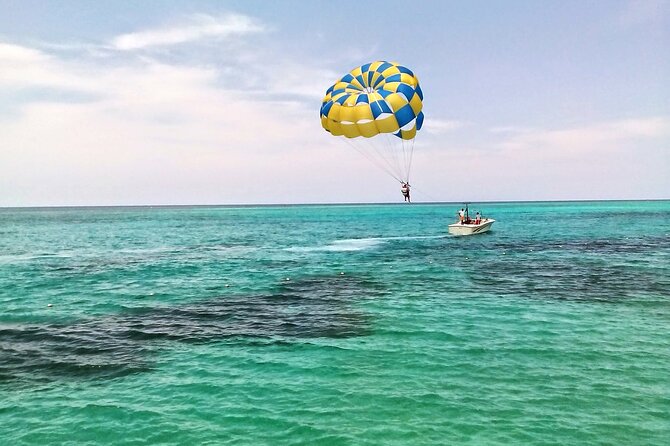 Grate River Rafting with Limestone Massage, Jet Ski and Parasailing combo tour - Tropical Bliss Beach and the one-hour water-sports stop