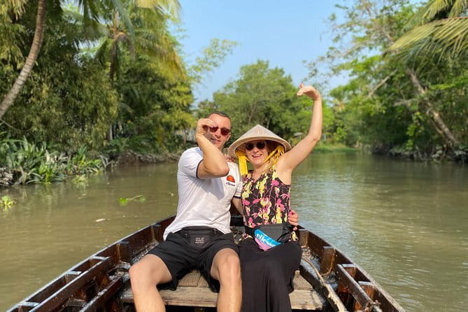 Hau River Floating Market and Con Son Islet Adventure - Making traditional cakes with a local host