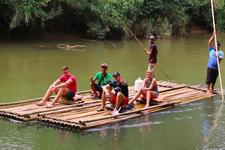 Khao Lak: Khao Sok Bamboo Rafting and Elephant Bathing Trip - Feeding and bathing elephants at the rescue camp