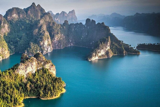 Khao Sok: Full Day Bamboo Rafting Tour from Khao Lak - Bamboo rafting is calm, scenic, and not whitewater rafting