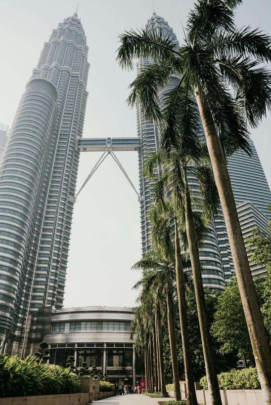 KL: Day Tour with Rafting, Fireflies, and Meals - Kuala Lumpur’s towers: big sights, short visits