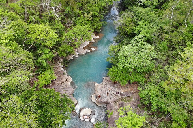 La Leona waterfall Cliffjumping White water Tubbing PrivateTour - White-water tubing on the Colorado River