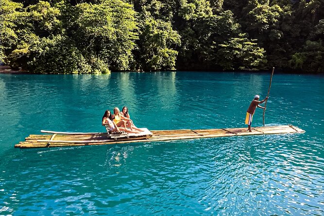 Martha Brae Rafting Experience w/Jerk Chicken Lunch, Montego Bay - Boarding the bamboo raft at Martha Brae Rafting Village