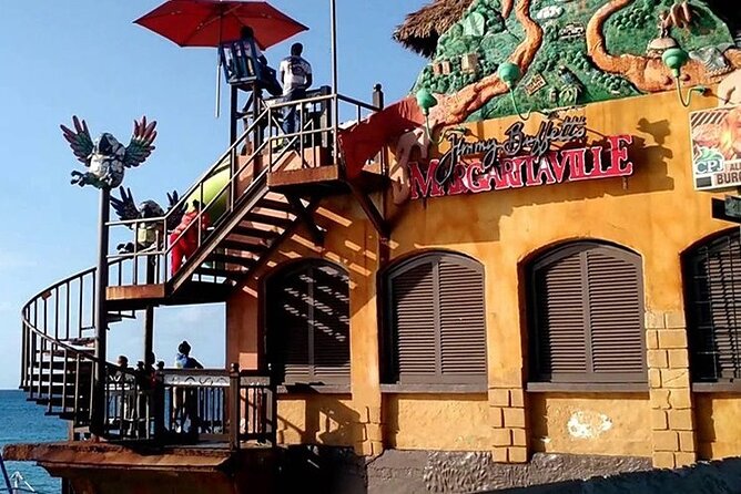 Montego Bay Highlights Tour & Bamboo Rafting from Mobay/ Falmouth - Jimmy Cliff Boulevard and Margaritaville