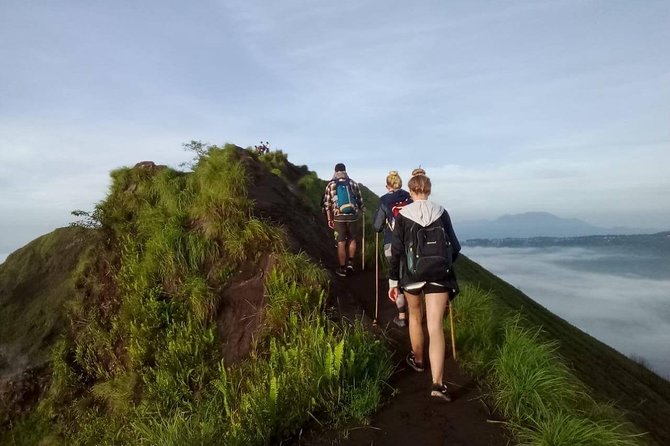 Mount Batur Sunrise Trek and Ayung River White Water Rafting Tour - A rocky climb with a cold wait at the top
