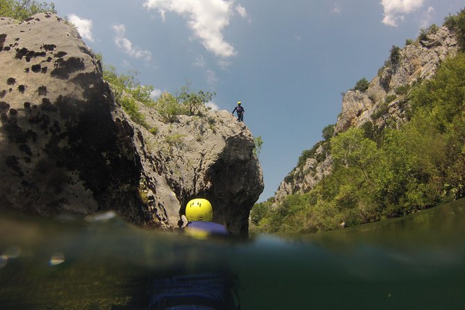 Multi Adventure Experience - Rafting with elements of canyoning - Swimming and snorkeling in clear river water