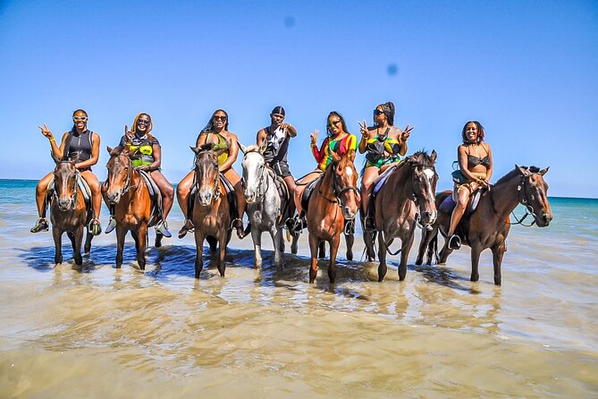 Ocho Rios ATV, Horseback Riding, Dunn's River and Bamboo Rafting - Climbing Dunn’s River Falls