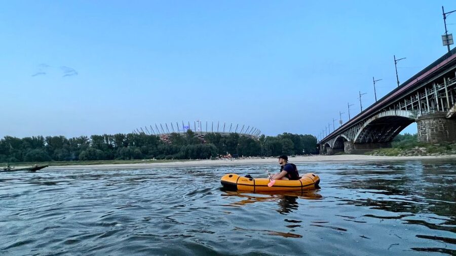 Packrafting kayaking guided tour Vistula river Warsaw Poland - Sunset, islands, and the Old Town