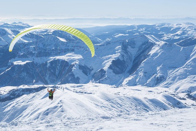 Private Full Day Tour In Kazbegi - Gudauri (Paragliding & Rafting) - Gergeti Trinity Church is the day’s high point