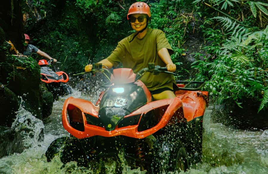 Quad bike bali tunnel waterfall with Rafting - The countryside route through rice fields and jungle