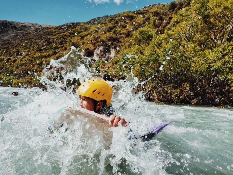 Queenstown: White Water Surfing Along the Kawarau River - Getting ready in a 5mm wetsuit