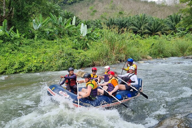 Rainforest Day Trip with Cave, Rafting, ATV & Lunch - Bamboo rafting through the Phang Nga rainforest