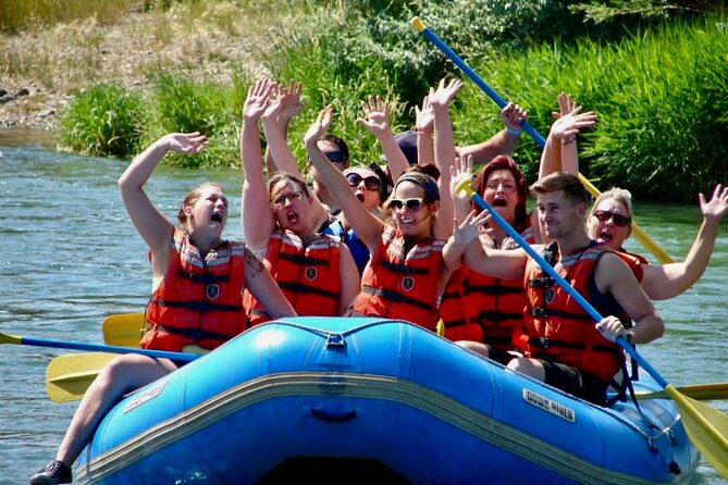 Red Canyon River Trips Whitewater 7 Mile Adventure 1:00PM Daily - Reading the scenery between the rapids