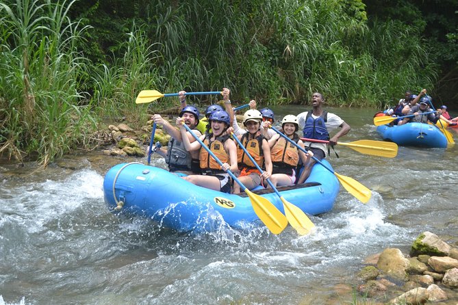 River Rapids Waterfalls Rafting and Beach Adventure - A bamboo rest stop with a rope swing