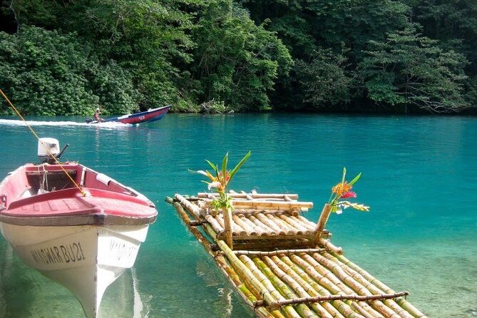 Royal Bamboo Rafting Adventure - Floating Jamaica’s river on a decorated bamboo raft