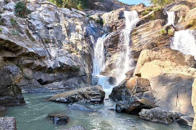 Secret Waterfall and Bamboo Rafting from Chiang Mai - A waterfall stop with time to linger