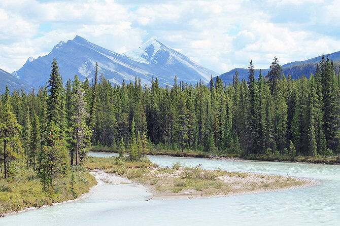 Sunwapta Challenge Whitewater Rafting: Class III Rapids - The 13-kilometer run: calm water first, stronger rapids later
