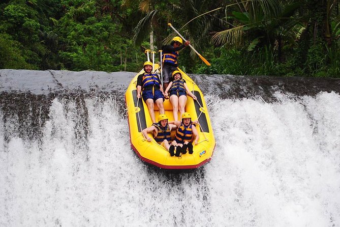 Telaga Waja River White-Water Rafting with Buffet Lunch - Walking through the rice paddies to the river