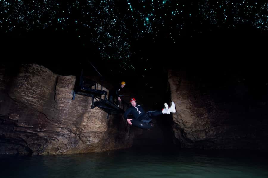 Waitomo Caves: Labyrinth Black Water Rafting Experience - The final stream, rock slide, and return to daylight