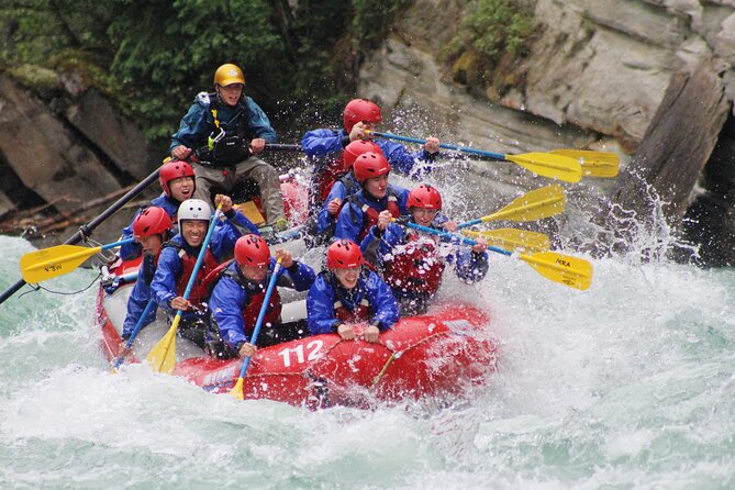 Whitewater Rafting on Jasper's Fraser River - Guides who keep the raft involved