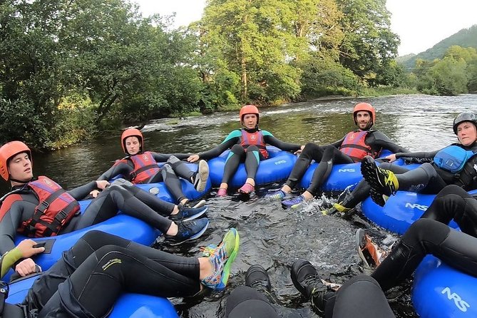 Whitewater River Tubing in Llangollen - Calm water, rocks, and rapids